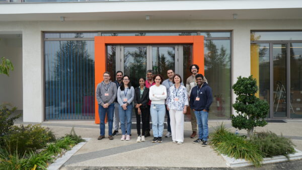 Group smiling in front of the CYRIC building in Cyprus