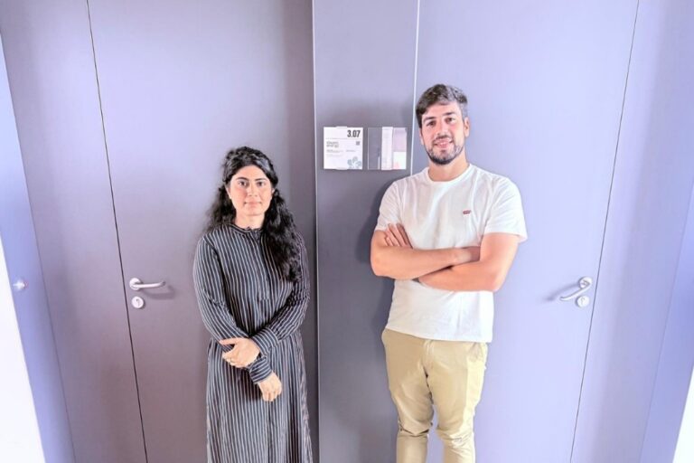 Madia with colleague at Cleanwatts Digital offices in Portugal